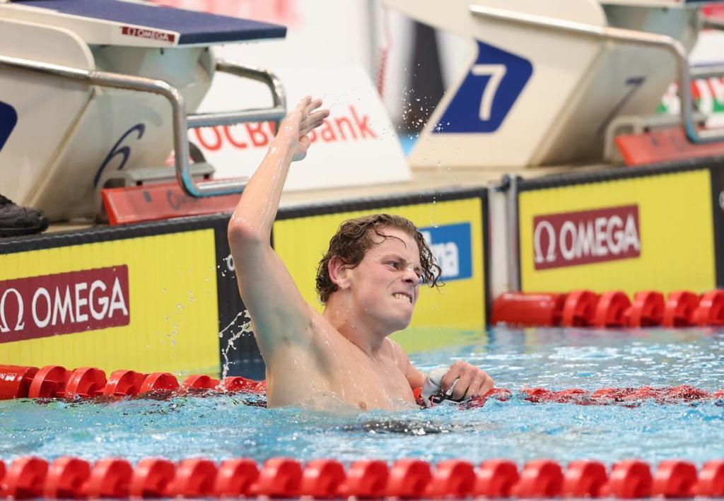 Swimmer celebrating after a race